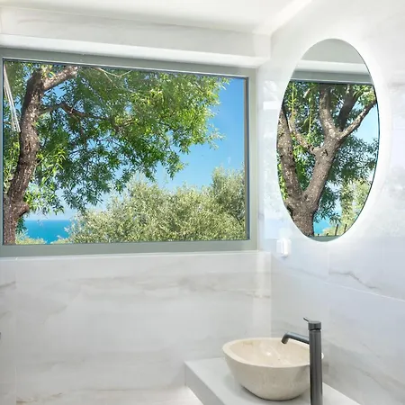 Апартаменты Assini Estate - Poolside & Seaview Getaways Корони