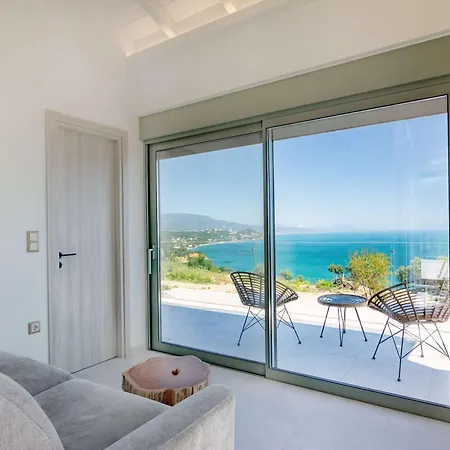 Апартаменты Assini Estate - Poolside & Seaview Getaways *